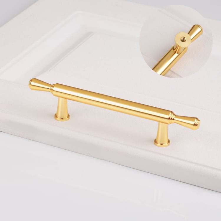 Möbelgriff Grava – T-Bar-Griff in Mattschwarz oder glänzendem Gold, erhältlich als Knopf sowie in 96, 128 und 192 mm. Ideal für Küchenschränke, Kommoden und Garderoben – egriffe.de