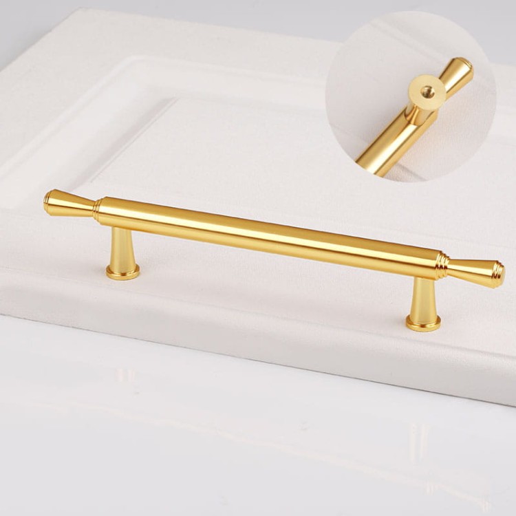 Möbelgriff Grava – T-Bar-Griff in Mattschwarz oder glänzendem Gold, erhältlich als Knopf sowie in 96, 128 und 192 mm. Ideal für Küchenschränke, Kommoden und Garderoben – egriffe.de