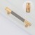 Möbelgriff Laure – goldener Leistengriff mit passendem Knopf und gerändelter Industrial-Oberfläche. Als Knopf sowie in 96, 128 und 256 mm erhältlich, ideal für Küchen-, Bad- und Büromöbel, Schränke und Schubladen – egriffe.de