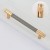 Möbelgriff Laure – goldener Leistengriff mit passendem Knopf und gerändelter Industrial-Oberfläche. Als Knopf sowie in 96, 128 und 256 mm erhältlich, ideal für Küchen-, Bad- und Büromöbel, Schränke und Schubladen – egriffe.de