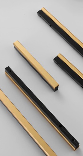 Möbelgriff Tulima – schwarzer linearer Griff mit goldener Front. Modern, erhältlich in 96, 128, 160, 192, 320, 546 und 960 mm – egriffe.de