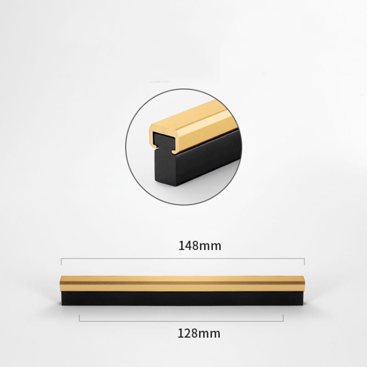 Möbelgriff Tulima – schwarzer linearer Griff mit goldener Front. Modern, erhältlich in 96, 128, 160, 192, 320, 546 und 960 mm – egriffe.at