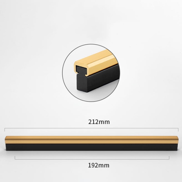 Möbelgriff Tulima – schwarzer linearer Griff mit goldener Front. Modern, erhältlich in 96, 128, 160, 192, 320, 546 und 960 mm – egriffe.at