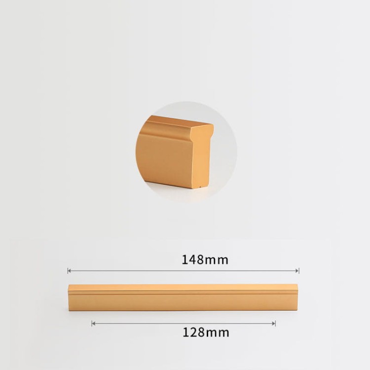 Länglicher Jimba-Möbelgriff in Champagnergold für Schränke mit 128 mm Lochabstand