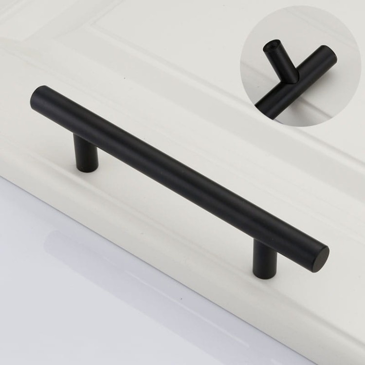 Möbelgriff Uno – T-Bar-Griff mit rundem Profil in Schwarz und gebürstetem Gold. Erhältlich als T-Bar-Knopf sowie in 96, 128, 160, 256, 512 und 850 mm – egriffe.de