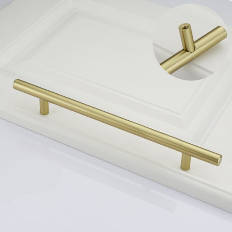 Möbelgriff Uno – T-Bar-Griff mit rundem Profil in Schwarz und gebürstetem Gold. Erhältlich als T-Bar-Knopf sowie in 96, 128, 160, 256, 512 und 850 mm – egriffe.de