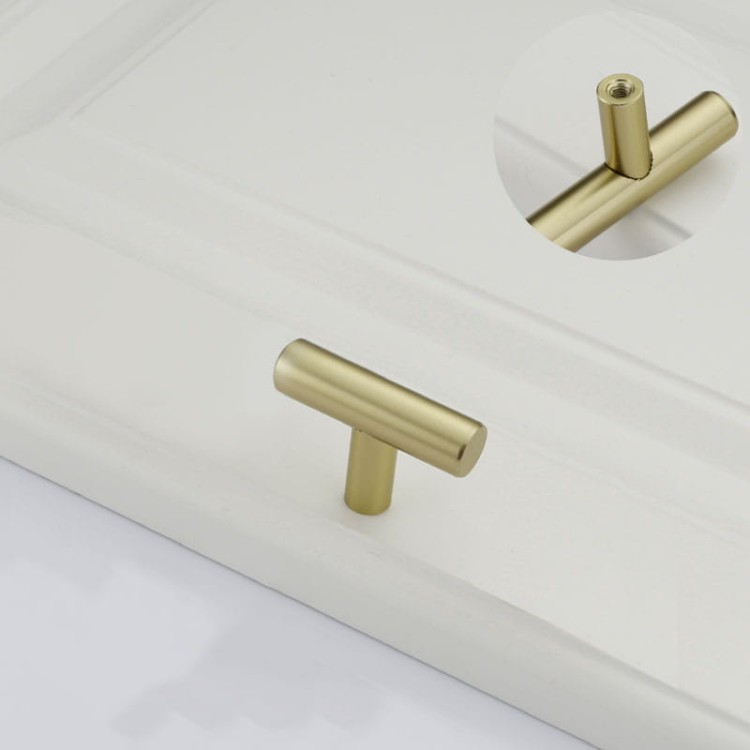 Möbelgriff Uno – T-Bar-Griff mit rundem Profil in Schwarz und gebürstetem Gold. Erhältlich als T-Bar-Knopf sowie in 96, 128, 160, 256, 512 und 850 mm – egriffe.de