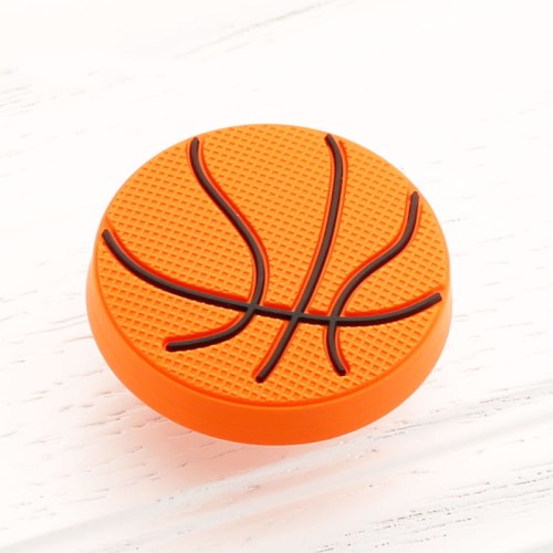 Orangefarbener Möbelknopf Basketball in Form eines Basketballs für das Kinderzimmer.