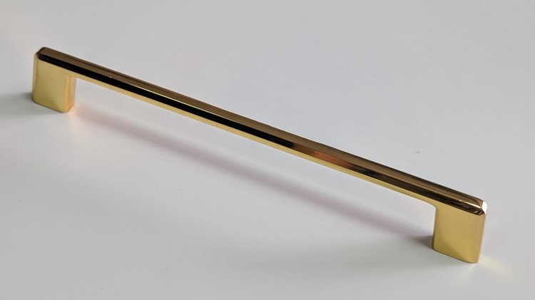 Möbelgriff Batuco – klassischer, schlichter und ergonomischer Griff in Perlgrau, Schwarz, gebürstetem Nickel, Gold und gebürstetem Gold. Größen 128–256 mm, ideal für moderne und klassische Möbel
