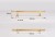 Möbelgriff Grava – T-Bar-Griff in Mattschwarz oder glänzendem Gold, erhältlich als Knopf sowie in 96, 128 und 192 mm. Ideal für Küchenschränke, Kommoden und Garderoben – egriffe.de