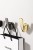 Wandhaken Alegre – moderne minimalistische Form aus robustem Material, einfache Montage. Ideal für Bad, Küche, Flur und Büro. Farben: Gold, Schwarz, gebürstetes Gold und Grau.