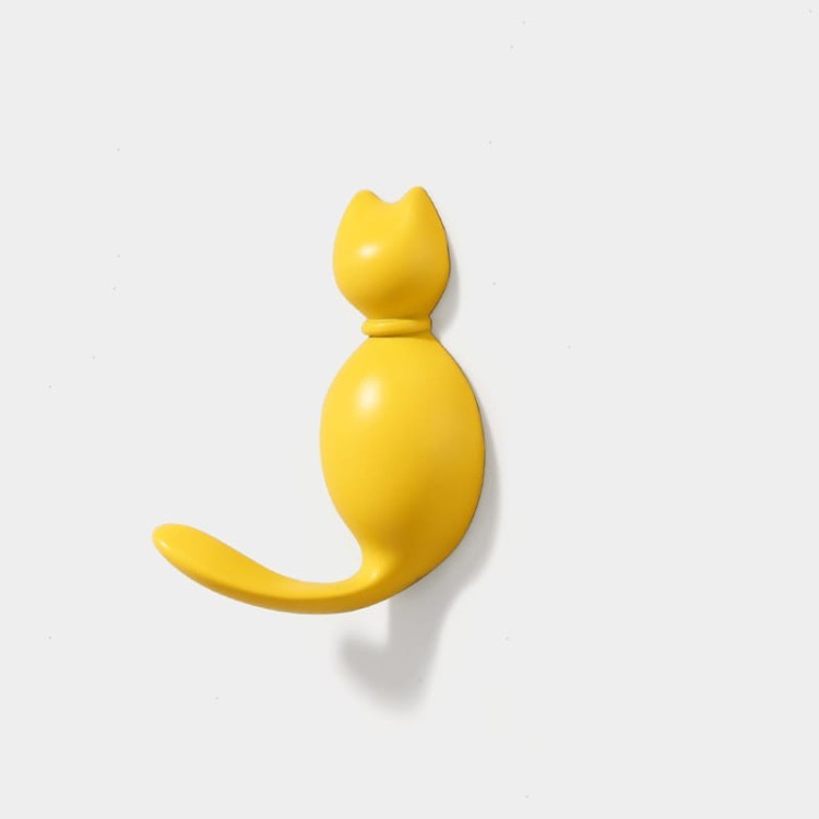 Niedlicher Wandhaken Gatito in Katzenform – ideal für Kinderzimmer und moderne Interieurs. Für Kleidung, Handtücher oder Schlüssel. Farben: Gold, Perlschwarz, Perlgrau, Gelb und Blau.