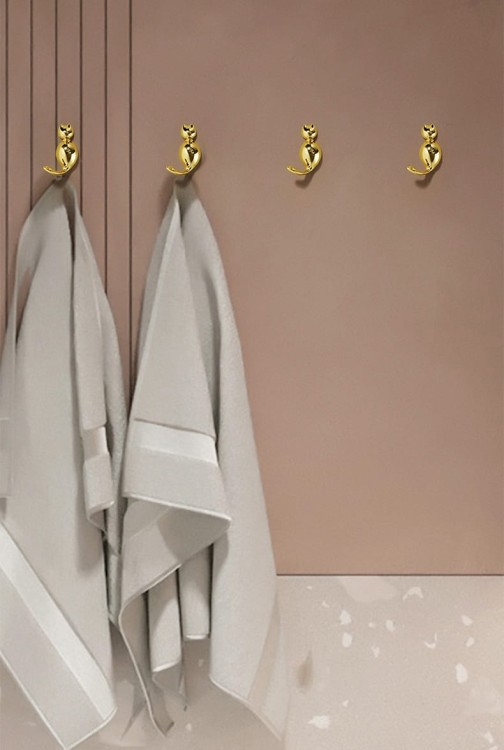 Niedlicher Wandhaken Gatito in Katzenform – ideal für Kinderzimmer und moderne Interieurs. Für Kleidung, Handtücher oder Schlüssel. Farben: Gold, Perlschwarz, Perlgrau, Gelb und Blau.
