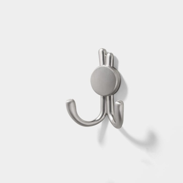 Wandhaken Rosa mit Doppelhaken und dekorativen diamantartigen Enden. Elegant, feuchtigkeitsbeständig, in vielen Gold-, Schwarz-, Silber- und Grautönen erhältlich – für Zuhause und gewerbliche Innenräume.