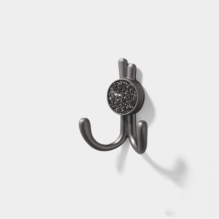 Wandhaken Rosa mit Doppelhaken und dekorativen diamantartigen Enden. Elegant, feuchtigkeitsbeständig, in vielen Gold-, Schwarz-, Silber- und Grautönen erhältlich – für Zuhause und gewerbliche Innenräume.