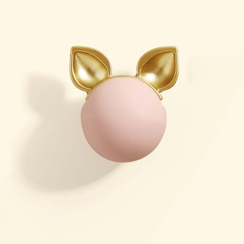 Kindermöbelgriff Pig – pastellfarbene Kugel mit niedlichen goldenen Schweineöhrchen. Farben: Rosa, Grün, Hellblau und Weiß. Ideal für Kommoden, Schränke und Schubladen im märchenhaften, modernen Kinderzimmer.