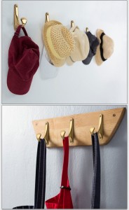 Wandhaken Tuli mit klassisch-eleganter Linie – robust, feuchtigkeits- und kratzbeständig, mit schneller Schraubmontage. Für Zuhause, Büro und Objektbereich. Farben: Schwarz, Chrom, Gold, Sandgold und Sandsilber.