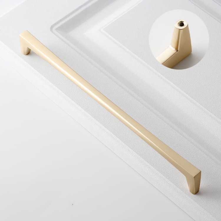 Möbelgriff Mela – moderner, klassischer und minimalistischer Griff in Schwarz, gebürstetem Gold, gebürstetem Nickel und Perlgrau. Größen 128–256 mm, ideal für Küchen- und Badmöbel, Garderoben und Kommoden.
