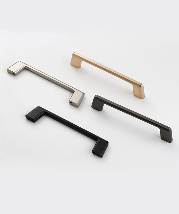Möbelgriff Batuco – klassischer, schlichter und ergonomischer Griff in Perlgrau, Schwarz, gebürstetem Nickel, Gold und gebürstetem Gold. Größen 128–256 mm, ideal für moderne und klassische Möbel